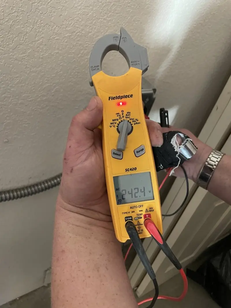 Voltage testing with clamp meter during Recessed Lighting Installation in Green Tree